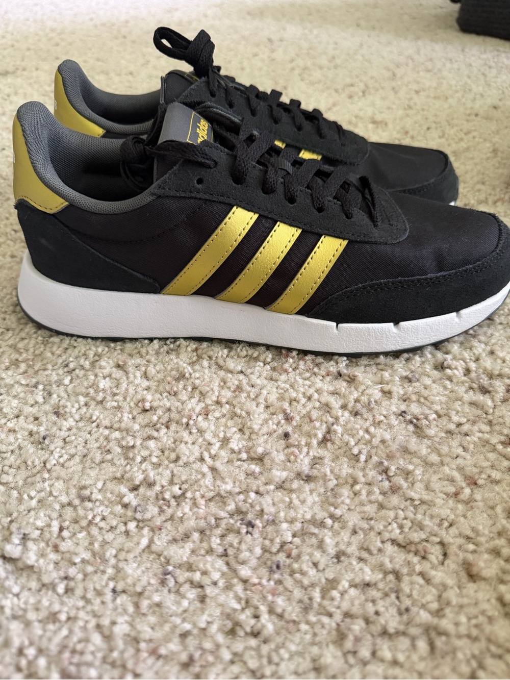 adidas Women's Black Sneakers with Gold Stripes